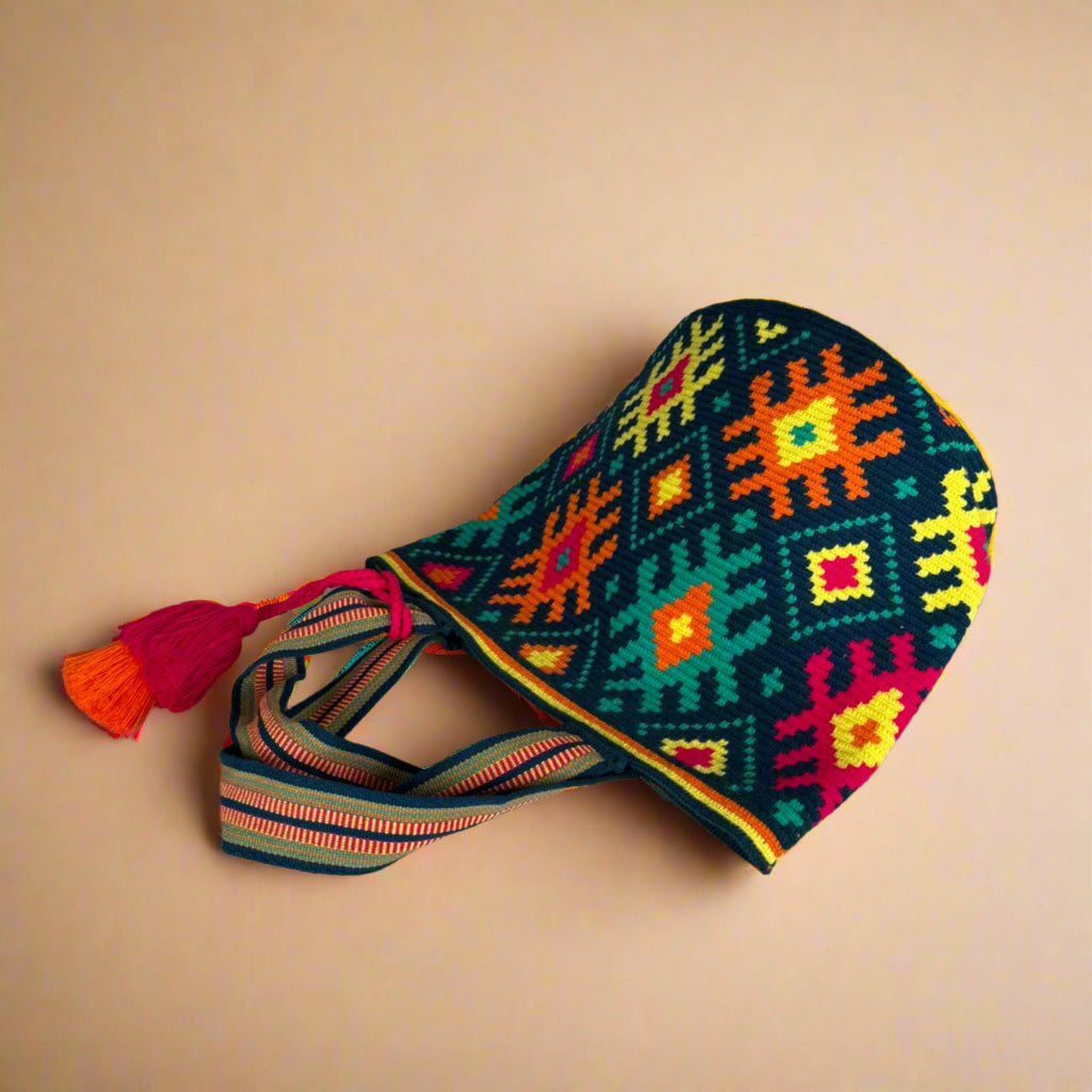 Wayuu Tote blue green orange connections laying on the ground