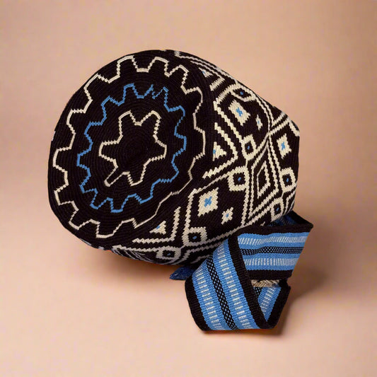 Decorative pillow with geometric pattern on a plain background