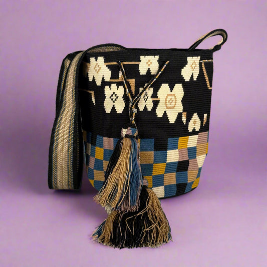Woven bag with floral and checkered patterns on a white background