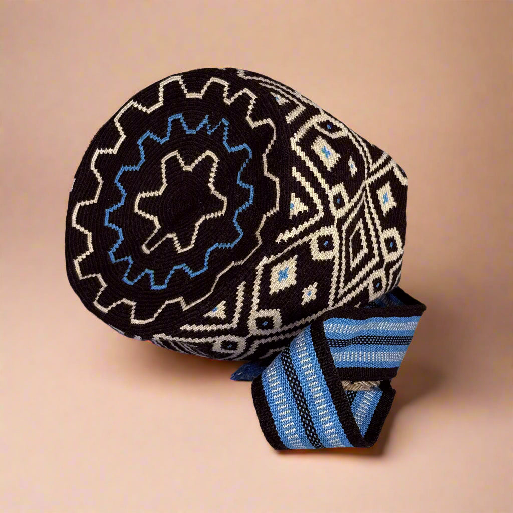 Decorative pillow with geometric pattern on a plain background